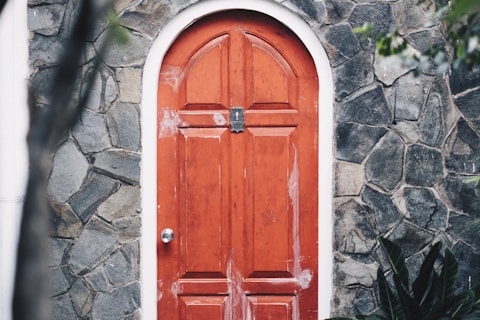 closed brown wooden panel door
