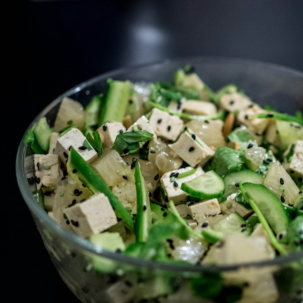 sliced of vegetables in clear glass bowl