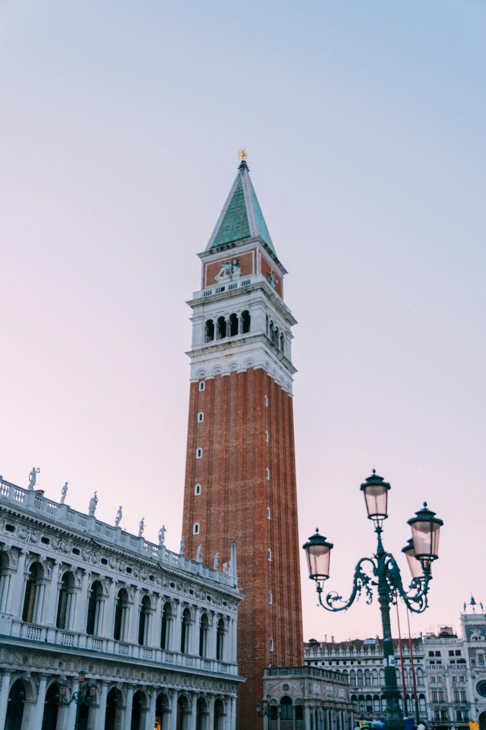 low-angle view of tower clock during daytime