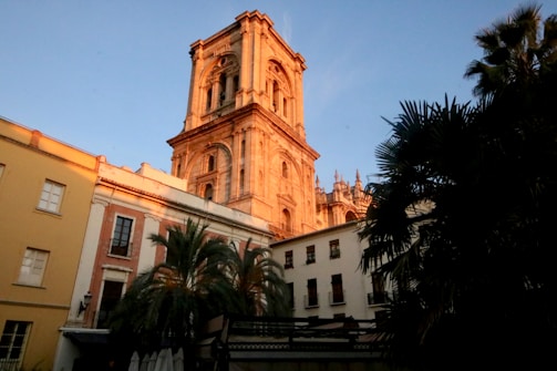 Historic architecture of Valencia bathed in warm sunset light.