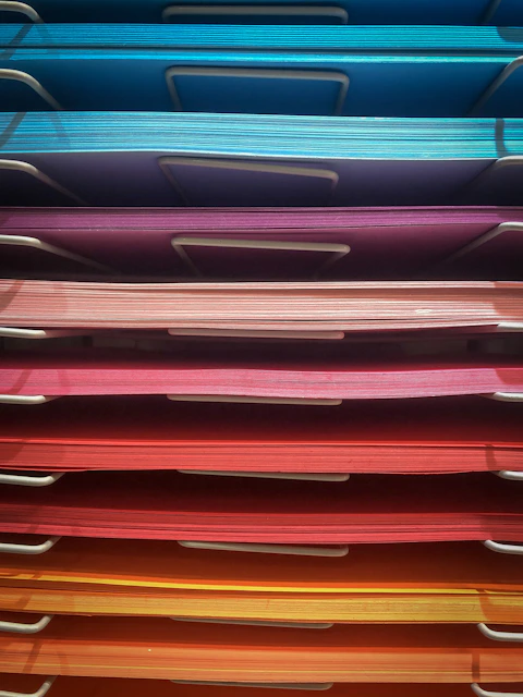 pile of assorted-color papers