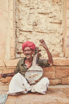 man playing string instrument