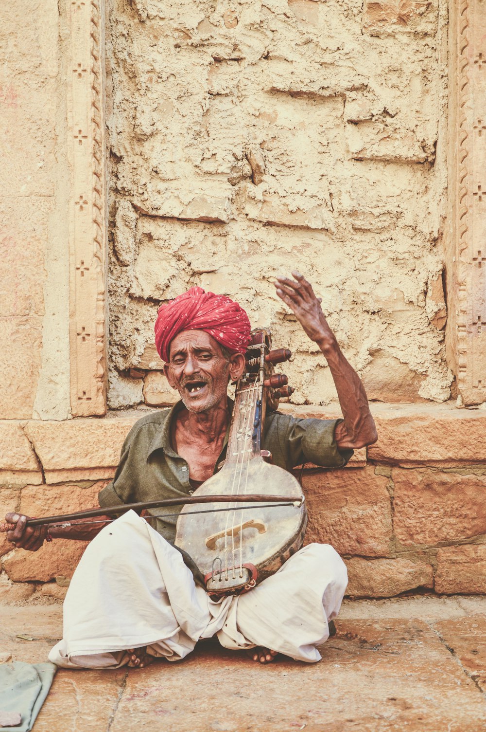 man playing string instrument