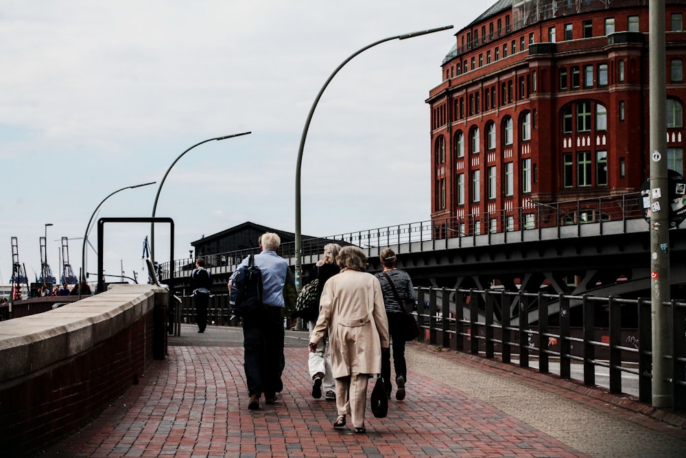 people walking along pathway