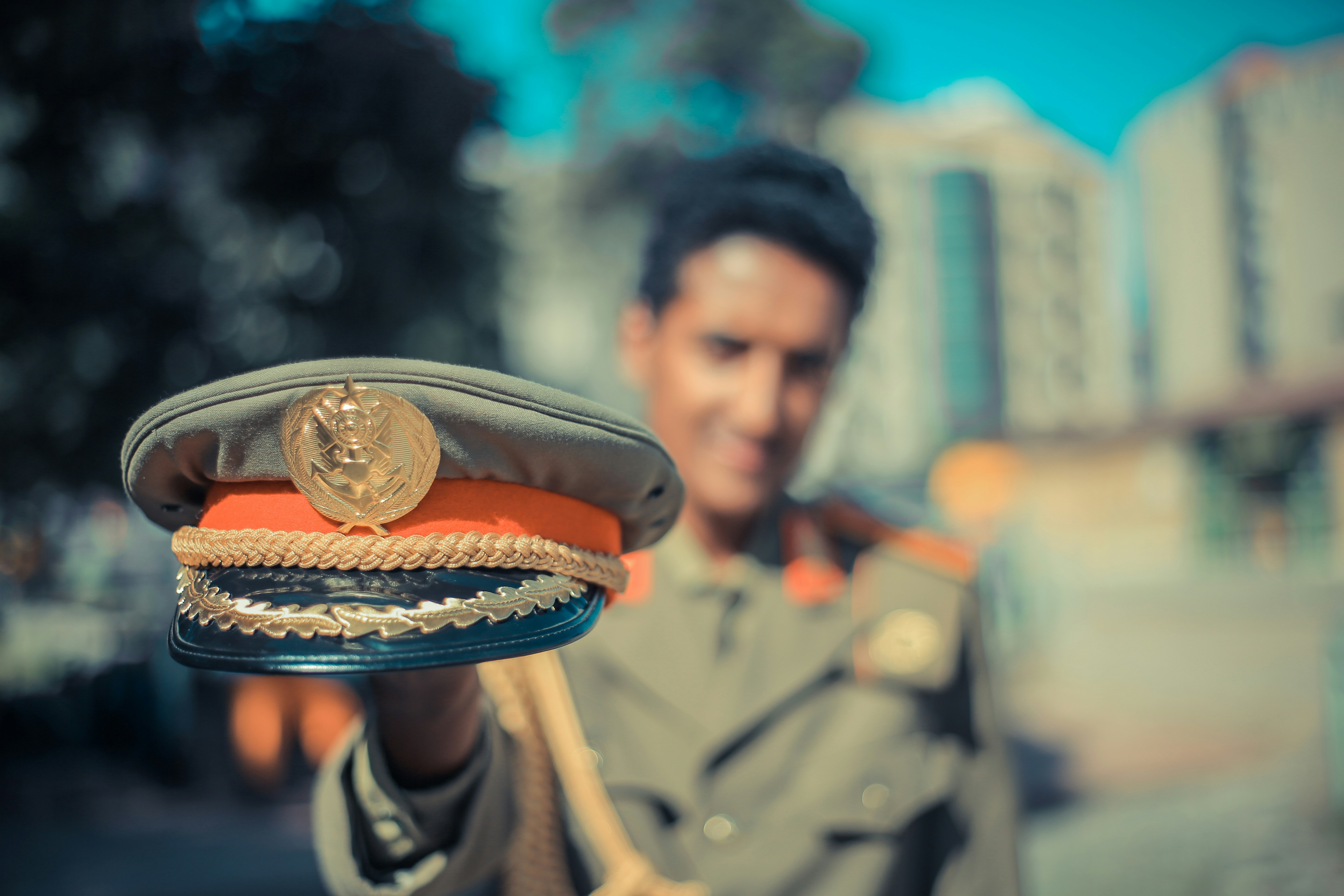 A sleek Indian Air Force Sukhoi-30 MKI fighter jet flying high in the blue sky, perhaps performing a maneuver.