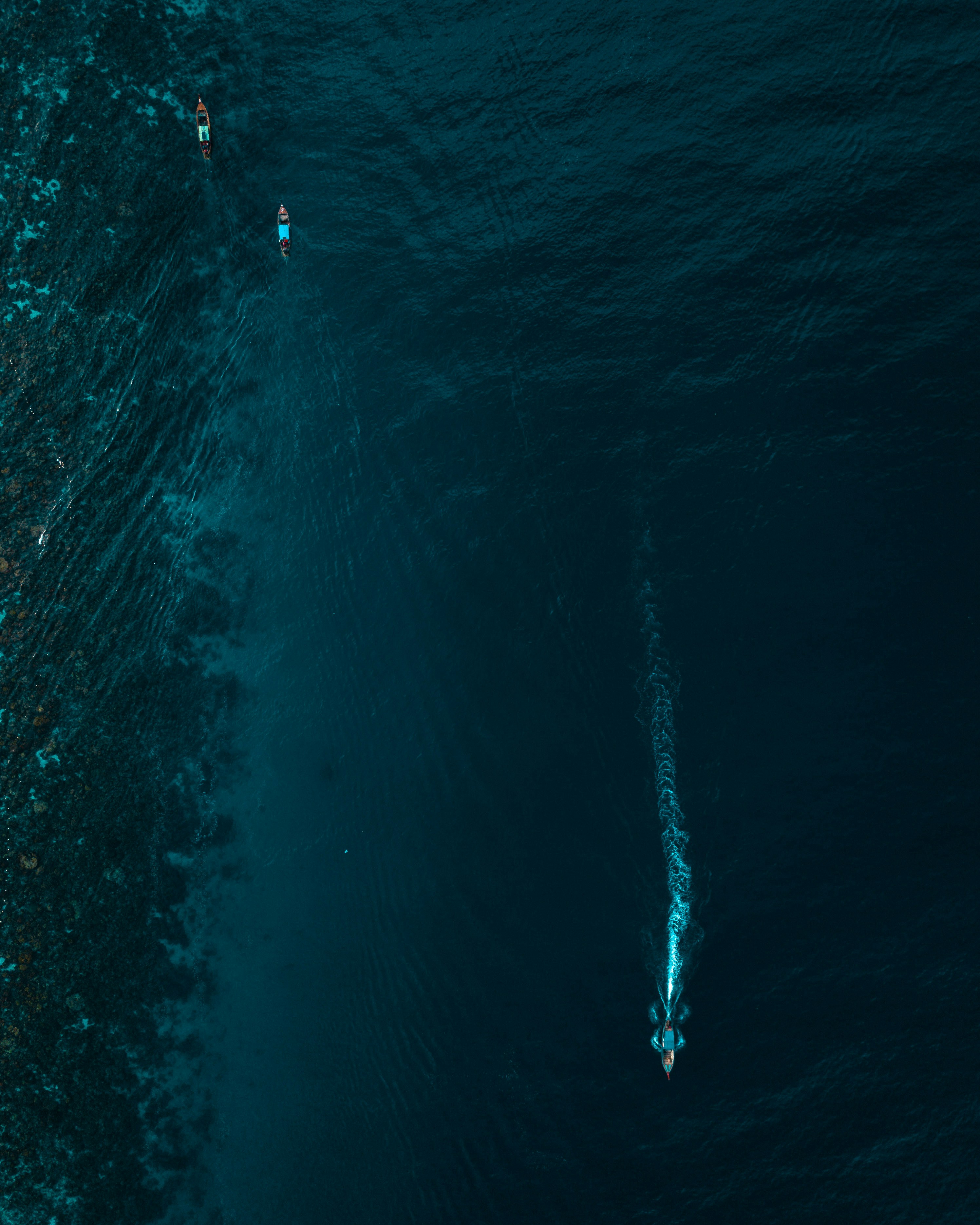 aerial view photography of boat on water