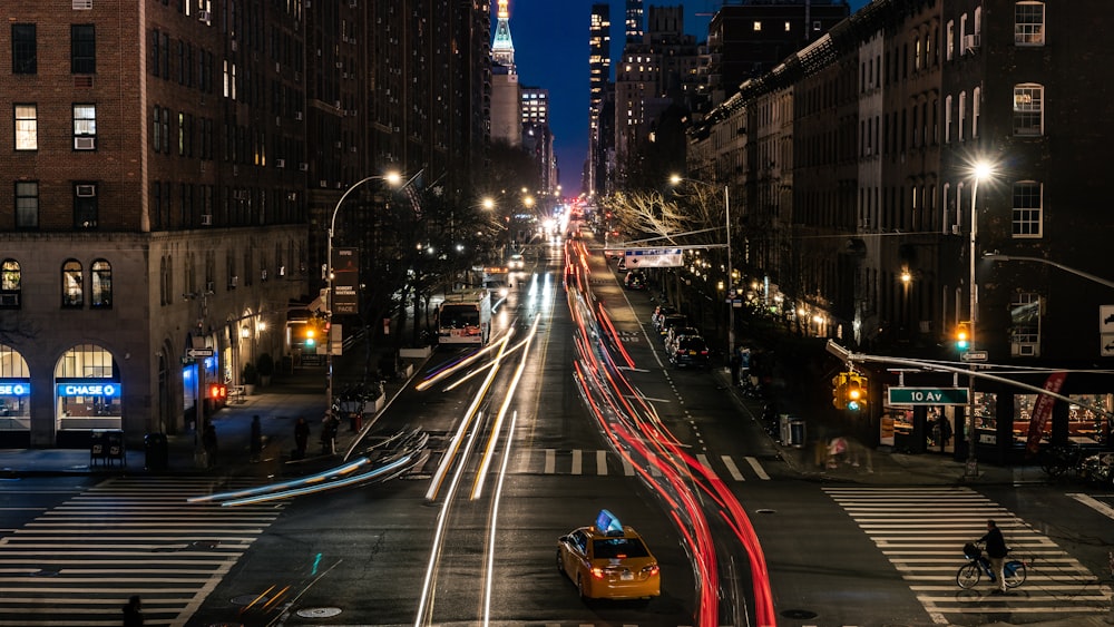 timelapse photography of busy intersection at night