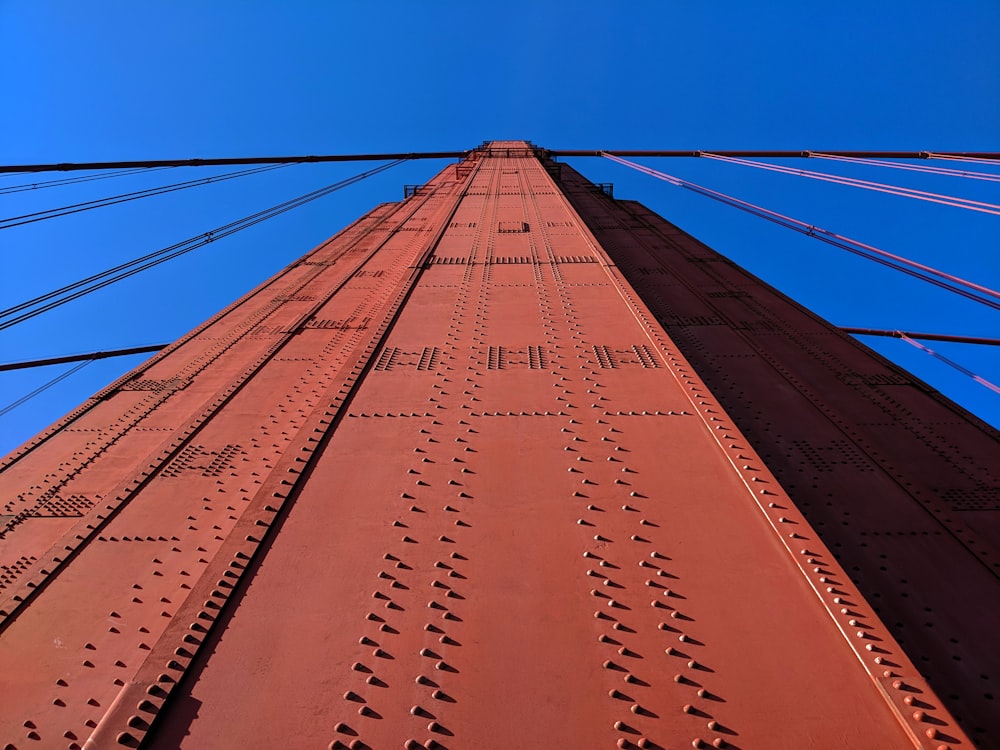 orange metal bridge during day time