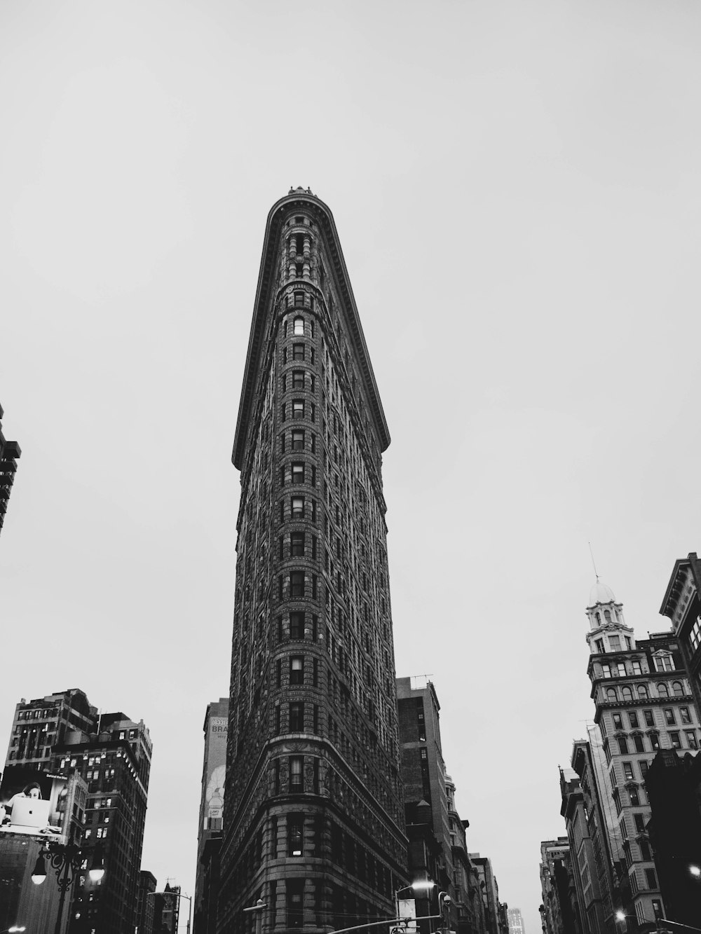 grayscale photography of flat iron building