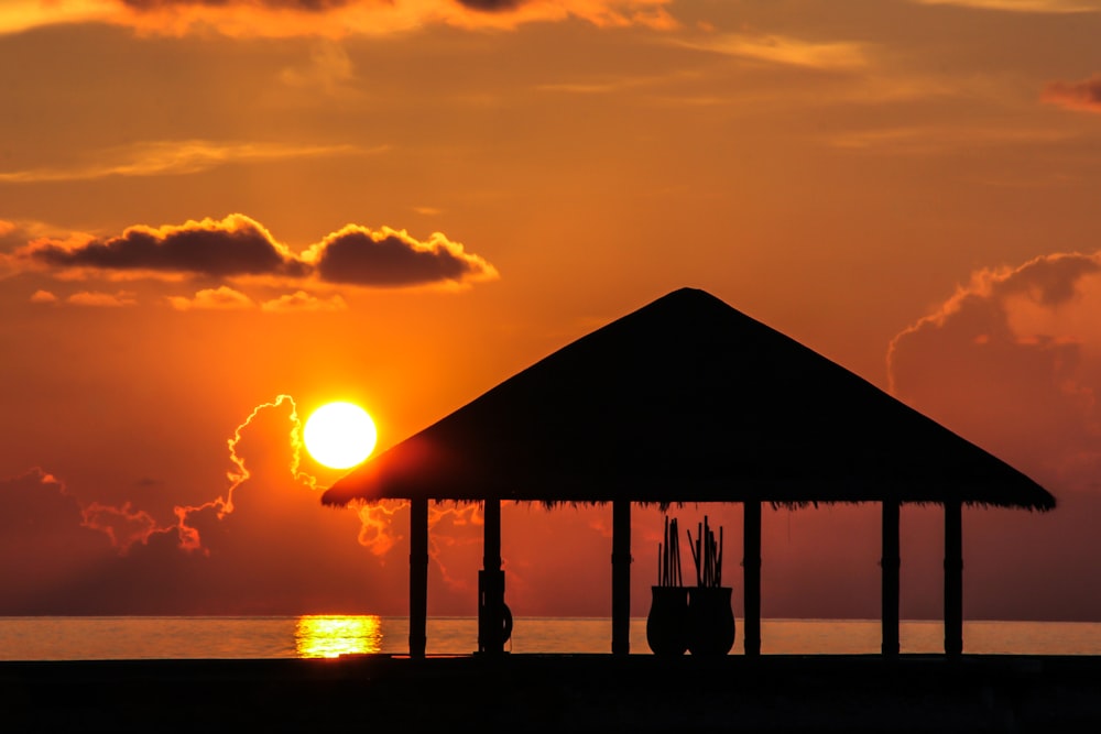 silhouette of hut