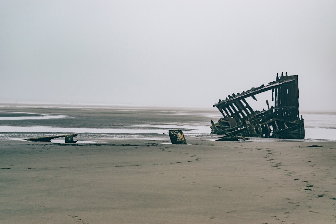 black metal frame on beach