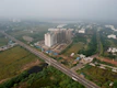 Aerial view of a growing urban neighborhood showcasing property development.
