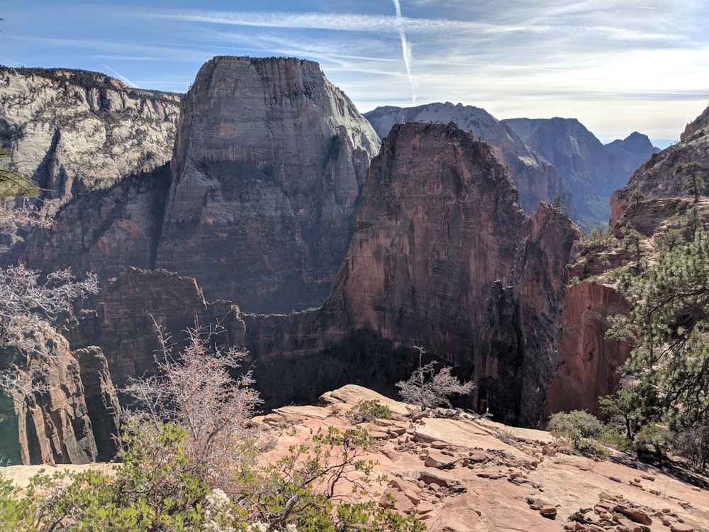 aerial photography of rock cliffs under blue sky