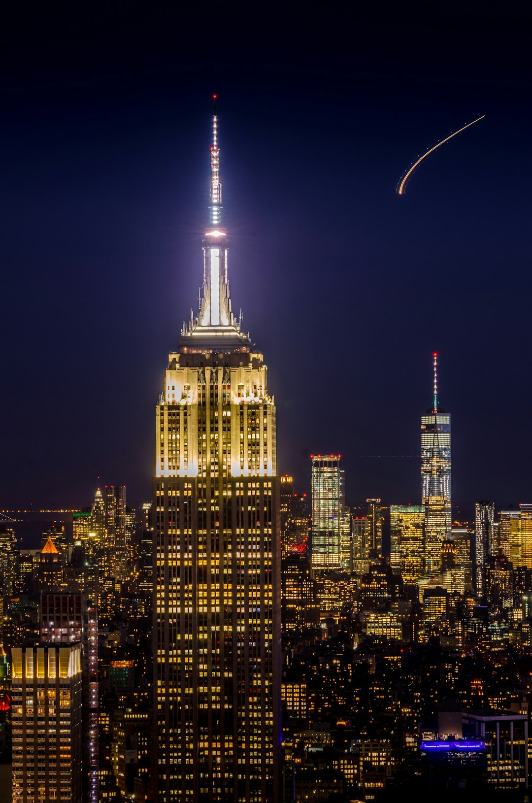 high rise building with lights-on at nighttime