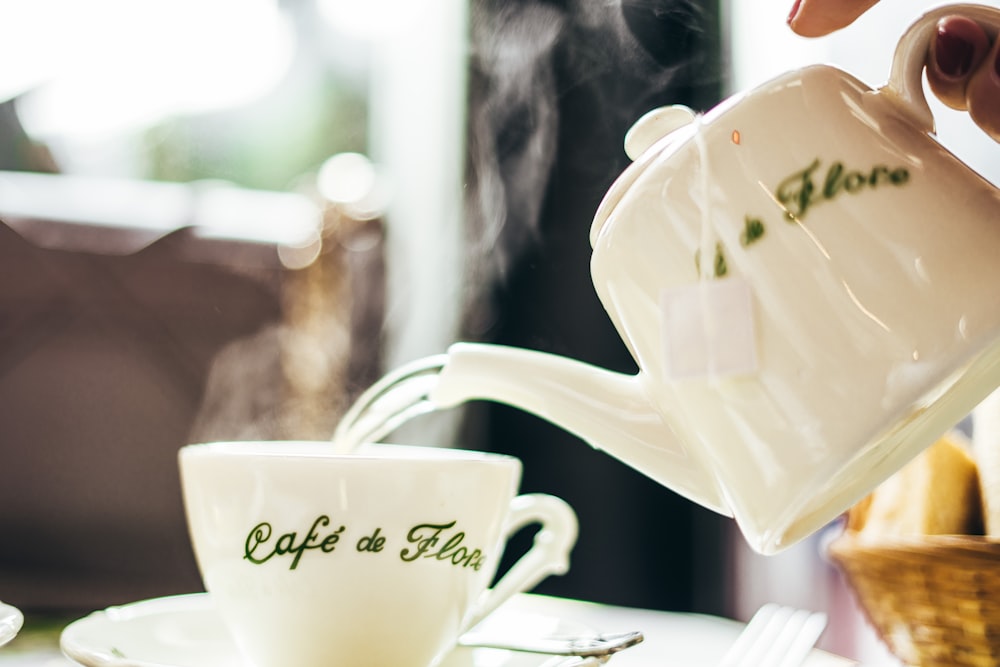 person pouring coffee