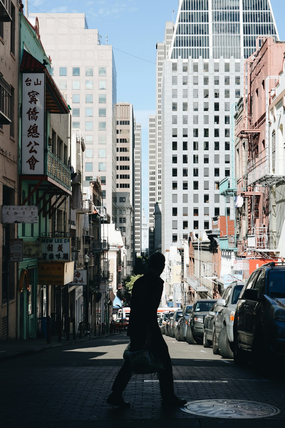 man crossing street