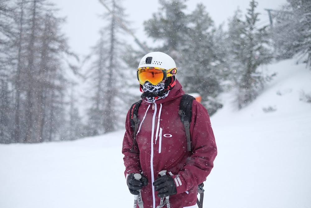 man wearing red caot