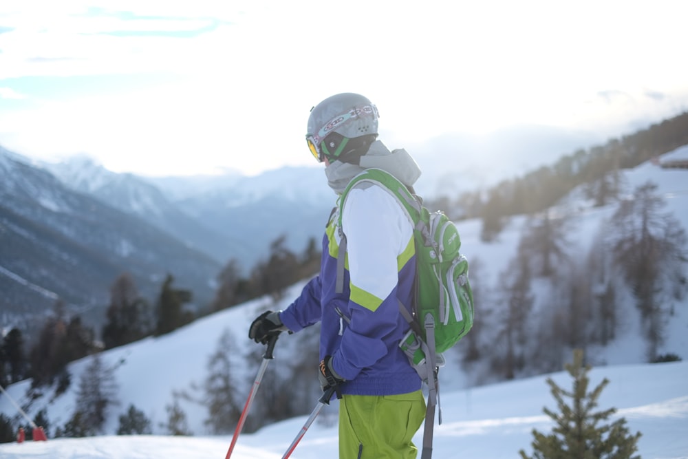 person standing on snow during daytime