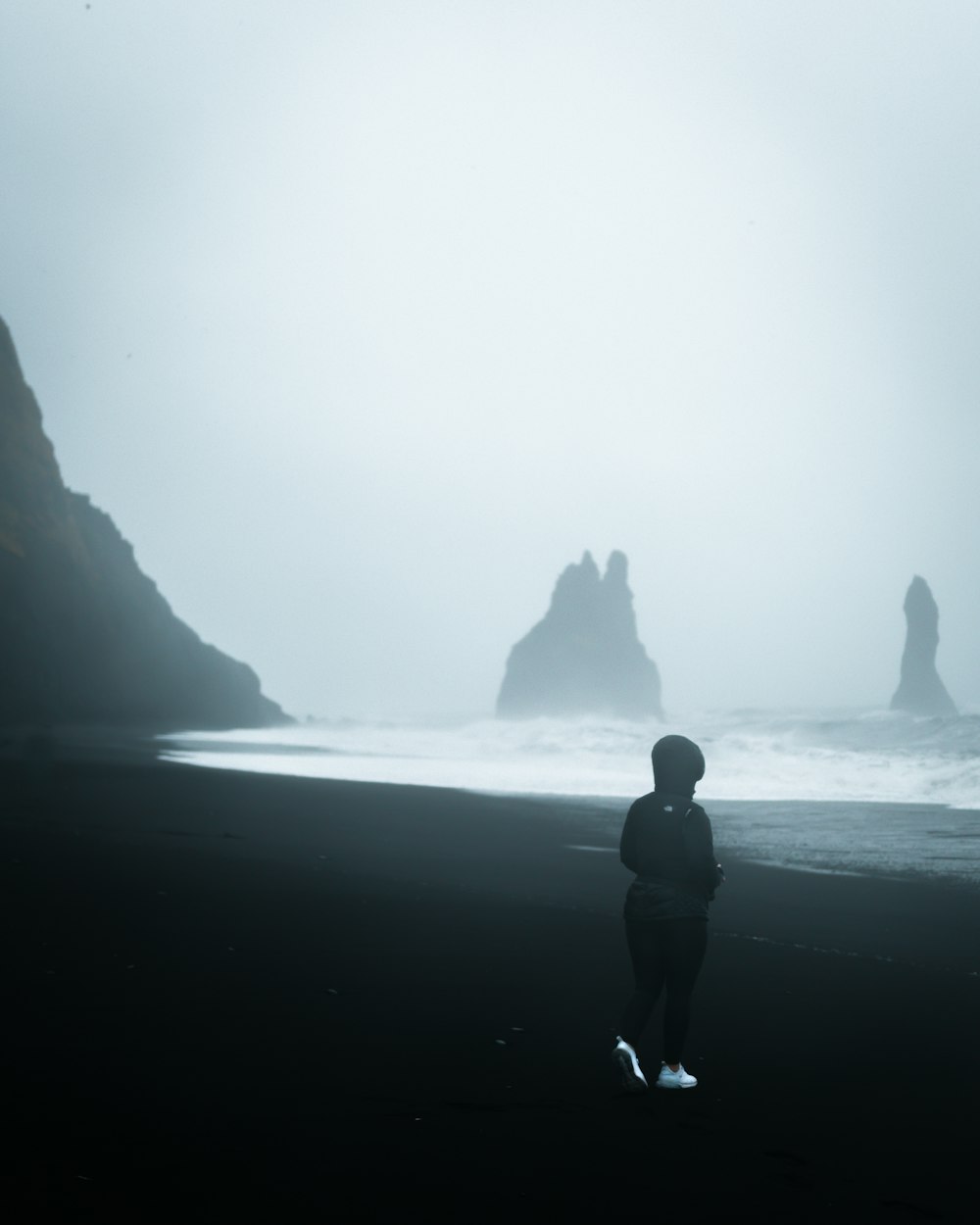 person standing on shore