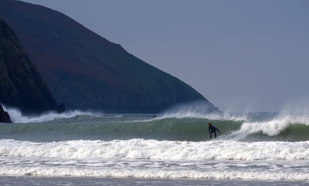 person surfing during daytime