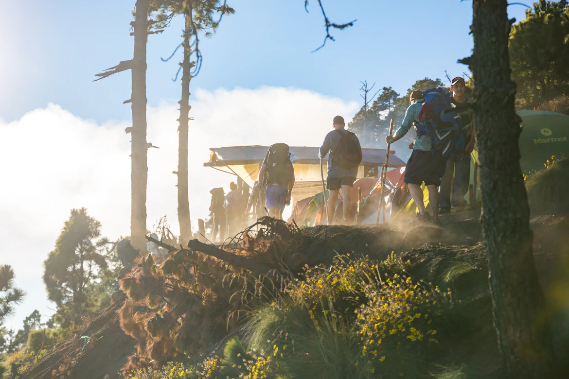 Hiking near a massive active volcano crater