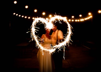 man and woman doing light writing photography