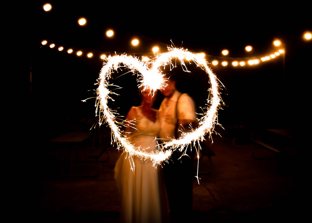 man and woman doing light writing photography