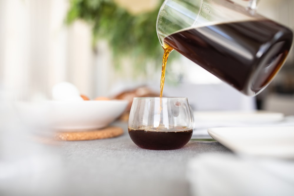 clear drinking glass with red wine