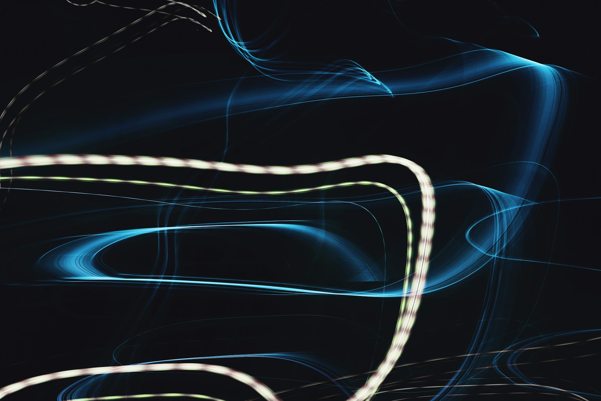 woman wearing yellow long-sleeved dress under white clouds and blue sky during daytime