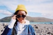 smiling woman wearing sunglasses