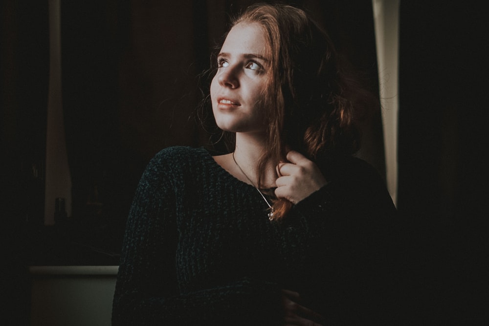 shallow focus photography of woman