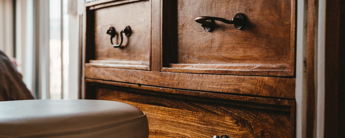 brown wooden drawer chest