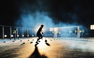 person playing soccer on field