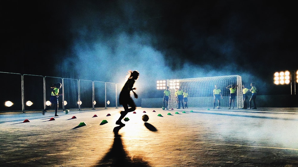 person playing soccer on field