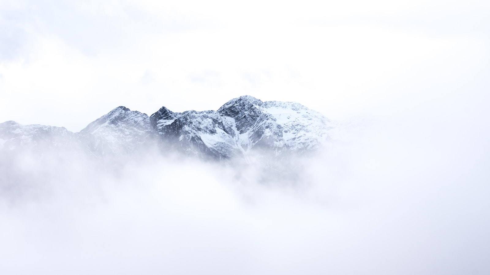 Sony SLT-A68 + Sigma 18-35mm F1.8 DC HSM Art sample photo. Snow mountain with clouds photography