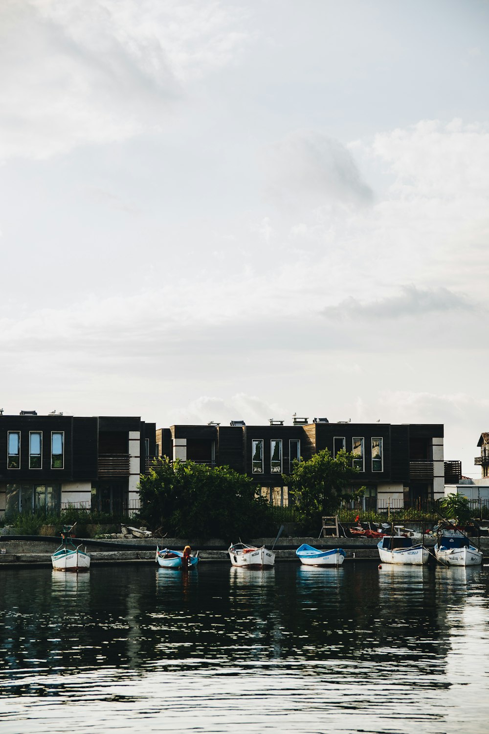 boat dock near building during daytime