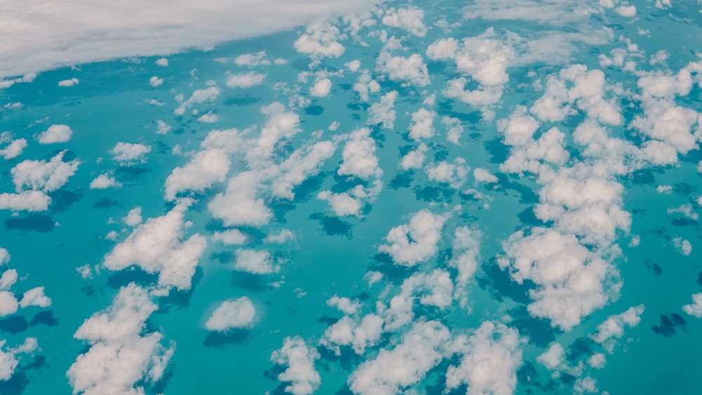 clouds over blue sea