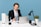 man sitting on chair beside laptop computer and teacup
