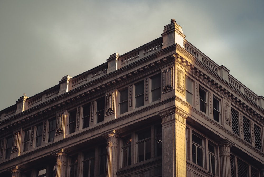 low angle photography of brown concrete building