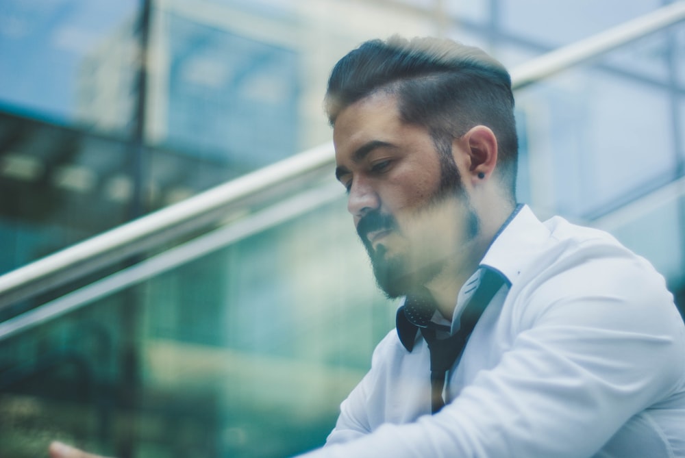 man wearing white dress shirt