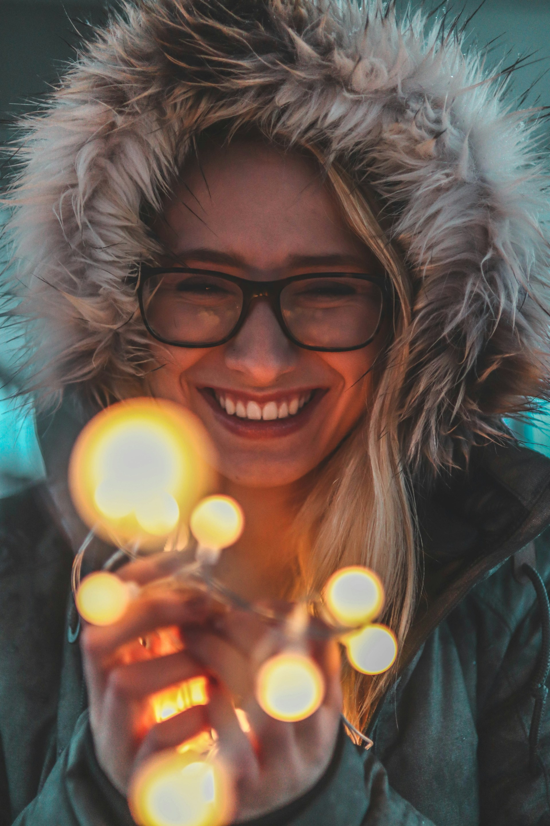 woman wearing yellow long-sleeved dress under white clouds and blue sky during daytime