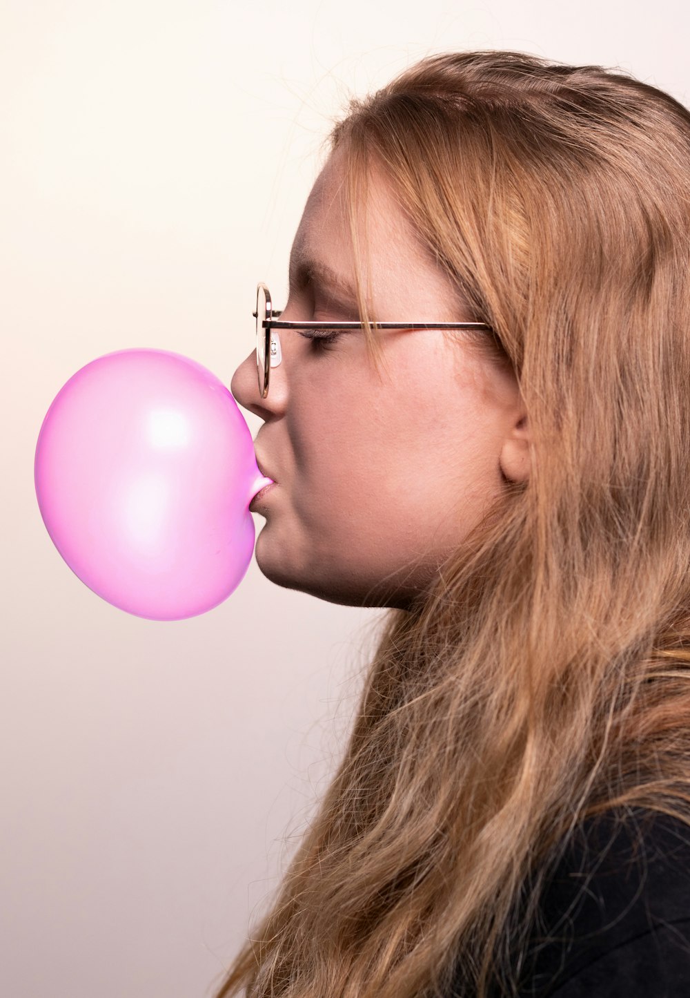 woman chewing bubblegum