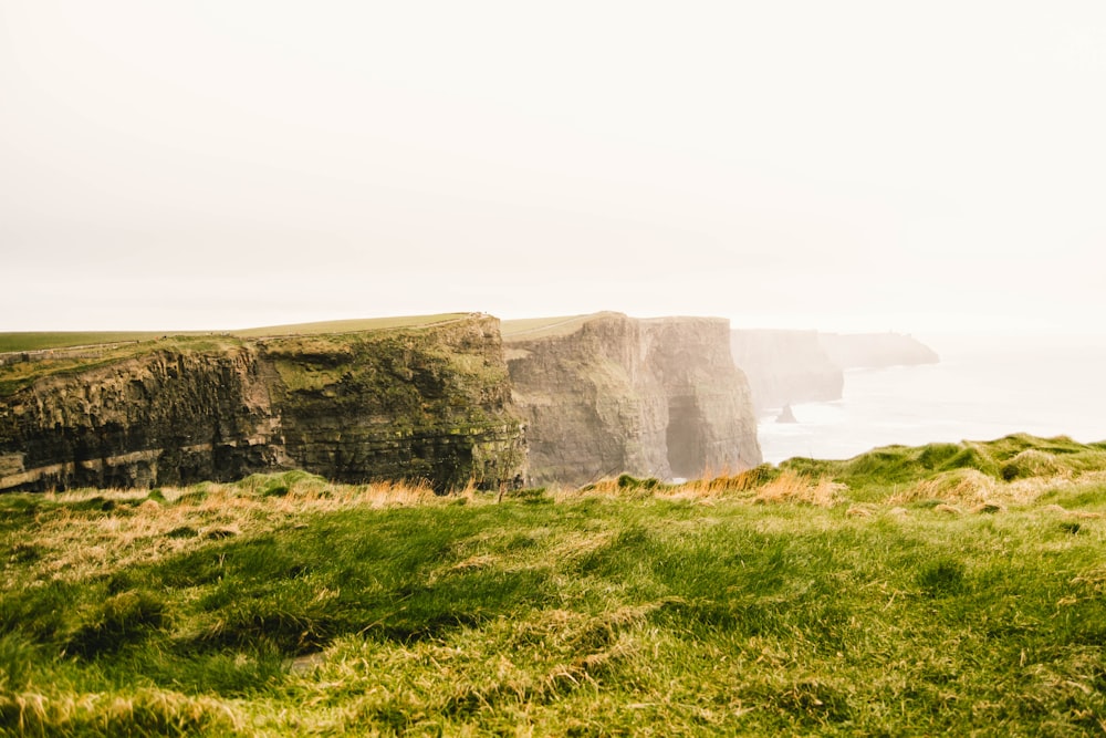 green cliff during daytime