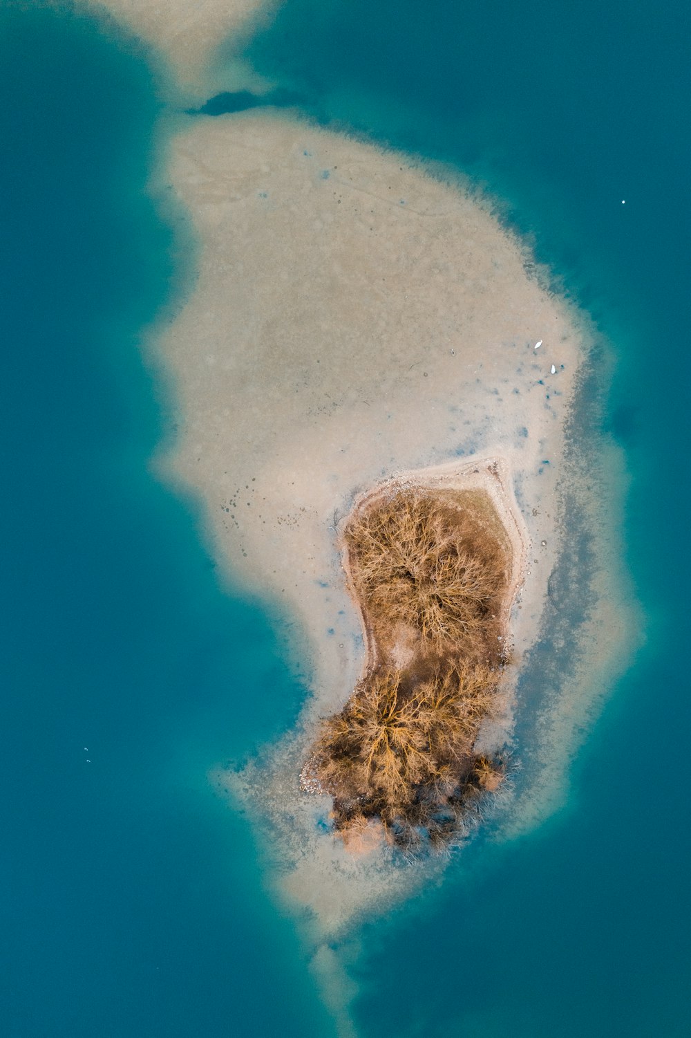 beige and white island aerial view