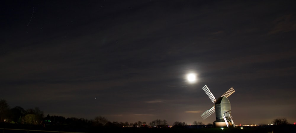 white windmill during nighttime