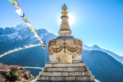 brown statue near the mountain nepal google meet background