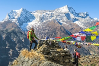 selective focus photography of hiker during daytime
