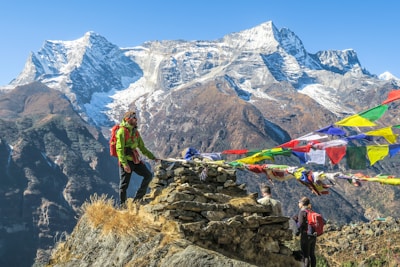 selective focus photography of hiker during daytime