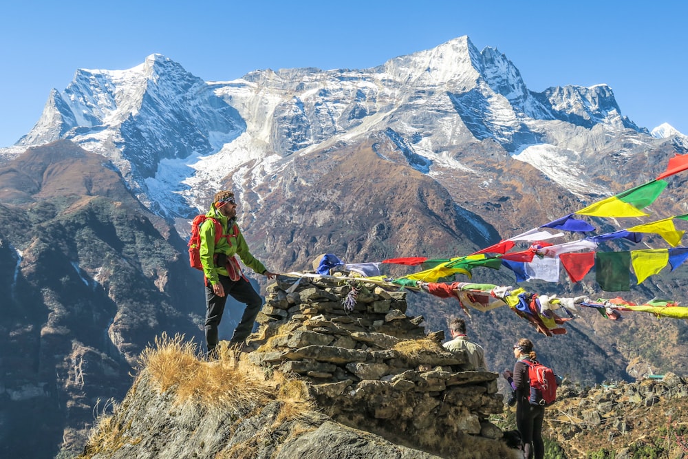 selective focus photography of hiker during daytime