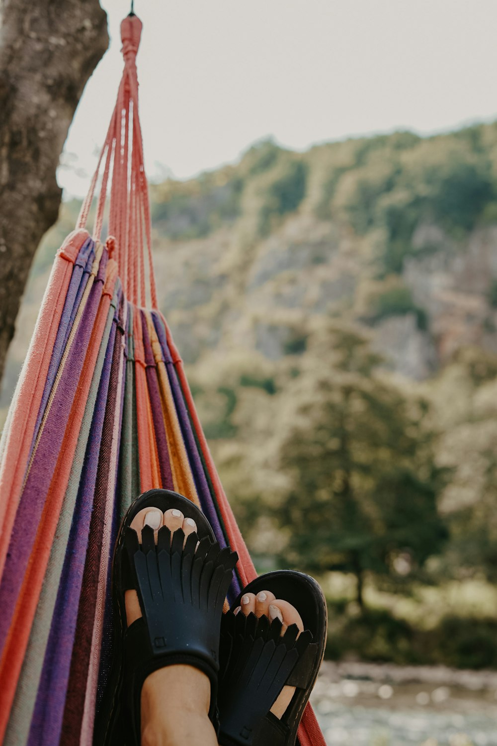 selective focus photography of black flat sandals